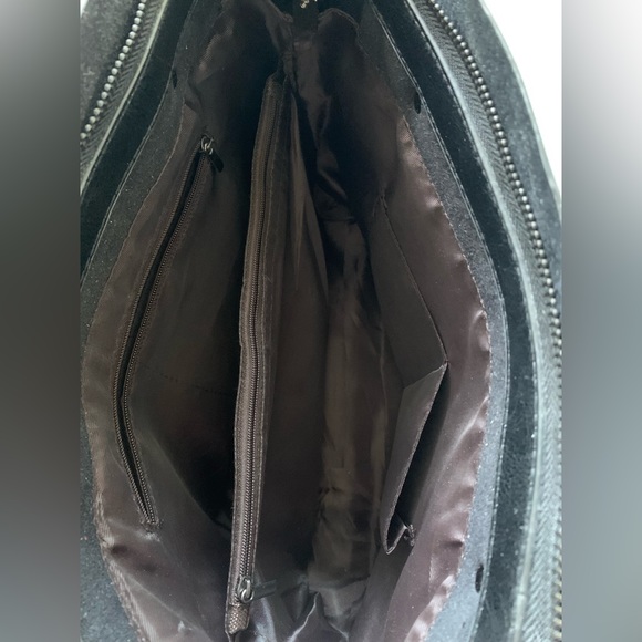 Black handbag with multiple interior pockets. - Picture 3 of 3